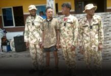 Arrested suspects in military uniform who robbed a woman of over N400K Says her In-law reveals she had money in her house.