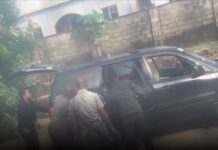 Police officers seen dehumanizing a woman whose son wasn’t available for arrest in Delta State