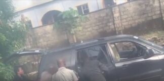Police officers seen dehumanizing a woman whose son wasn’t available for arrest in Delta State