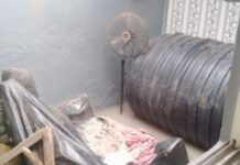 SAD!!!! Water Tank Falls Off Stand Into Building, Crush 20 Year Old to Death , Injure Others.