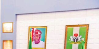 Reactions as Bola Ahmed Tinubu’s presidential portrait was spotted hanging behind Atiku Abubakar.