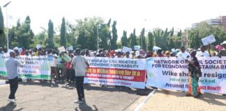 Resign Now, Massive Crowd Tells Wike As Protesters Storm National Assembly