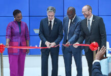 United States Secretary, Blinken Commissions American Corner In Lekki US Secretary of State Antony Blinken (L) and Chairman/CEO at 21st Century Technologies limited Wale Ajisebutu (R) look on during the American Corner Lekki Ribbon Cutting at 21st Century Technologies in Lagos on January 24, 2024.