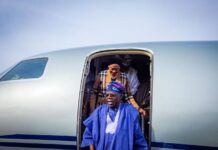 Tinubu returns to Abuja after two weeks