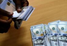 Naira down by 0.05%, trades N1, 476/$ at official market