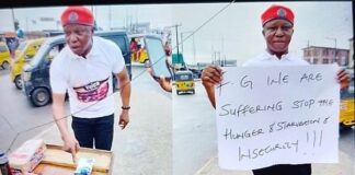 Human Rights Activist stages a one-man protest to challenge the government’s nonchalance over the plight of Nigerians.