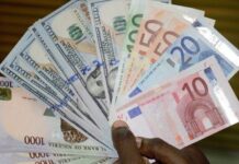 Naira gains N22, trades N1,564/$1 at official window
