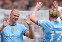 Haaland on target as Man City open title defence with win at Chelsea