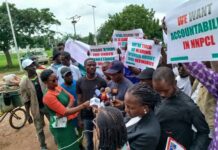 Protests rock Abuja over fuel scarcity as protesters demand sacking of NNPC boss, Kyari (Photos)