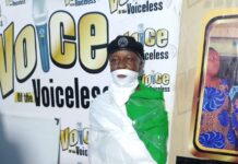 Nigeria@64: We are in bondage; the struggle for a change must continue—Human rights activist demonstrates captivity