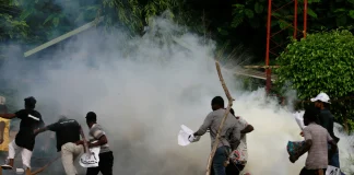 Breaking: Chaos in Lagos: Police Fire Tear Gas at Makoko Residents Demonstrating at State Assembly