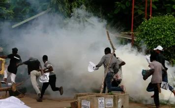 Breaking: Chaos in Lagos: Police Fire Tear Gas at Makoko Residents Demonstrating at State Assembly